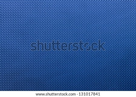 Blue plastic texture or background. The pattern is a diagonal colored square