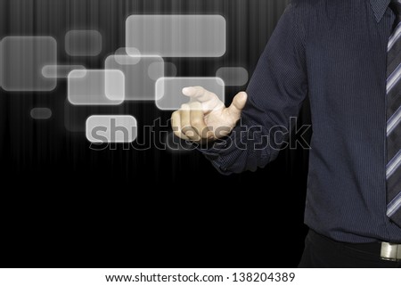Business man push the button on black  digital background.