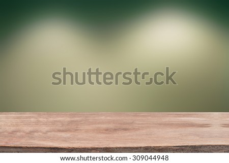 Wood table with blur concrete wall background - for montage or display  products