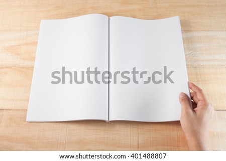 hand open blank\ book or magazines, \book mock up on wood background