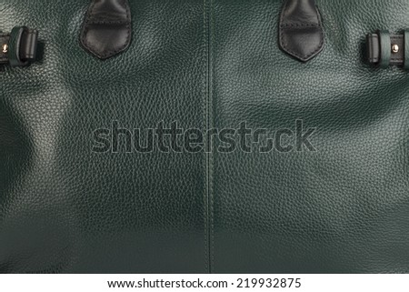 Green natural leather female purse closeup
