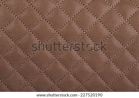 Light brown quilted leather background