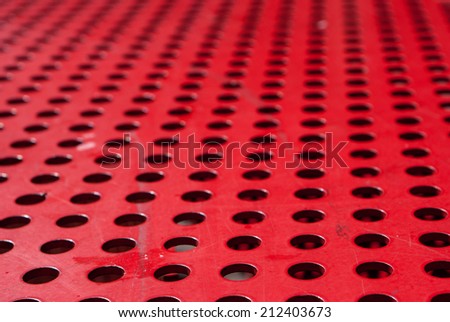 Red metal grate texture and background