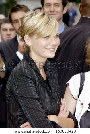 Actress Kirsten Dunst arrives at the premiere of THE DAY AFTER TOMORROW at the American Museum of Natural History, New York, May 24, 2004