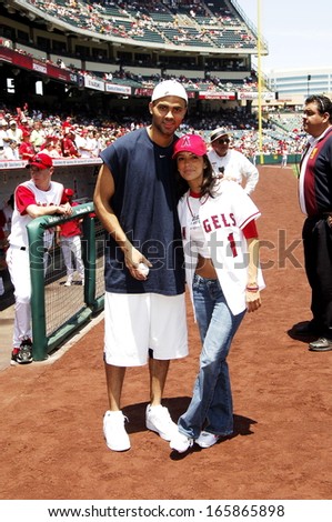 Tony Parker, Eva Longoria make an appearance to throw out the first pitch at the Los Angeles Angels baseball game against the New York Yankees, Angel Stadium, Anaheim, CA, Sunday, July 24, 2005