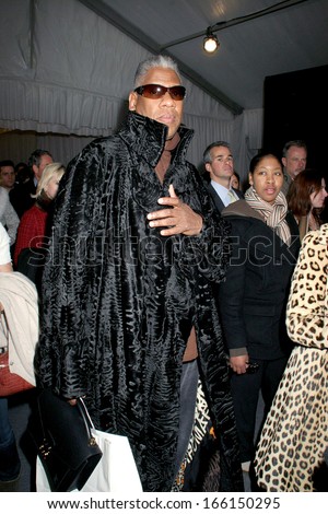 Andre Leon Talley, carrying a Louis Vuitton attache case, at fashion show for Michael Kors Fall 2006 Collection-Olympus Fashion Week, Bryant Park, New York, February 08, 2006