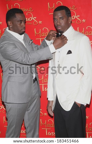 Sean Diddy Combs at a public appearance for Sean Diddy Combs Unveils Wax Figure at Madame Tussauds New York, Madame Tussauds New York, New York December 15, 2009  - stock photo