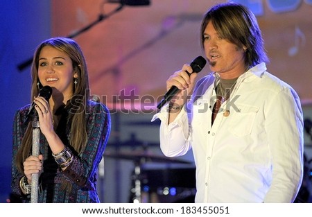 Miley Cyrus, Billy Ray Cyrus on stage for ABC Good Morning America Concert with Miley Cyrus, Hard Rock Cafe Times Square, New York, NY April 8, 2009