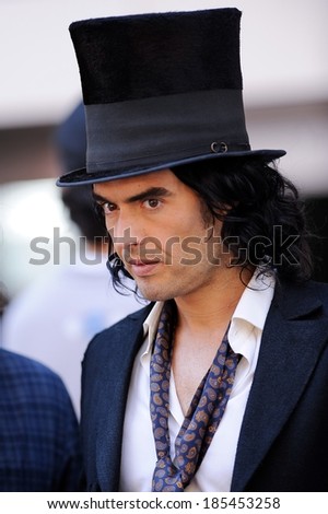 Russell Brand, films a scene at the Arthur\