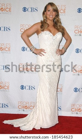 Mariah Carey, wearing a Ysa Makino gown, in the press room for People\'s Choice Awards 2010 - PRESS ROOM, Nokia Theatre, Los Angeles, CA January 6, 2010