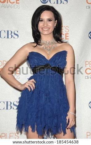 Demi Lovato, wearing a Jenny Packham dress, in the press room for People\'s Choice Awards 2010 - PRESS ROOM, Nokia Theatre, Los Angeles, CA January 6, 2010