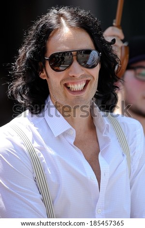 Russell Brand, walks to his trailer at the \'Arthur\' movie set in the East Village out and about for CELEBRITY CANDIDS - MONDAY, , New York, NY July 12, 2010