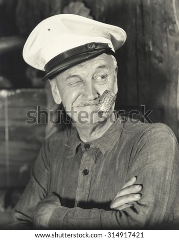 Sailor smoking corn pipe