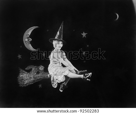 With the man in the moon and a witch on a broom, a flight of fantasy lights the night sky