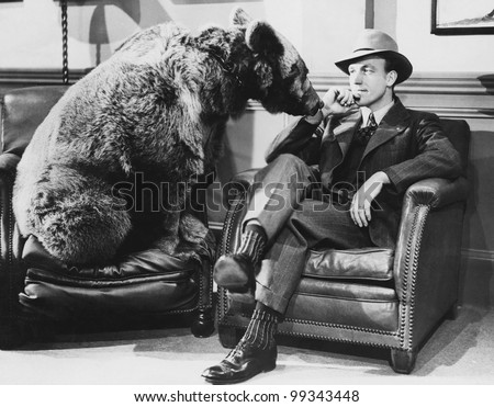 Thoughtful man with bear Thoughtful man with bear