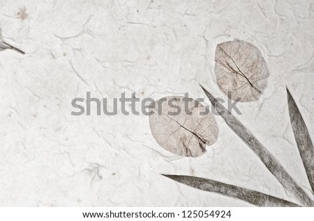Mulberry paper texture with bamboo leaves background. Retro, rough and rustic handmade paper