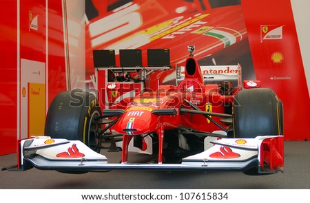 MOSCOW, RUSSIA - JULY 14: Scuderia Ferrari sport car at Moscow City Racing. Formula 1 teams show in historical city center of Moscow. Taken on July 14, 2012 in Moscow, Russia.