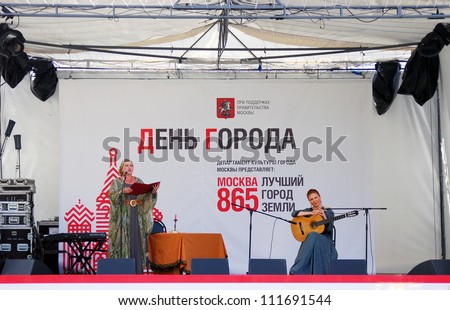 MOSCOW, RUSSIA - SEPTEMBER 01: Actors perform on stage at Muzeon park in conjunction with Moscow 865th birthday on September 01, 2012 in Moscow, Russia