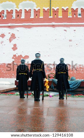 MOSCOW - FEBRUARY 2: Members of the Guard of Honor pay their respects at the tomb of the Unknown Soldier at the wall of Moscow Kremlin on February 2, 2013 in Moscow, Russia.