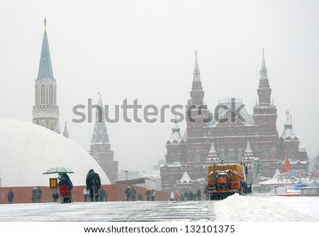 MOSCOW, RUSSIA - MARCH 15: Snow blower clears the Red Square from snow. Extreme snowstorm in Moscow. Taken on March 15, 2013 in Moscow, Russia.