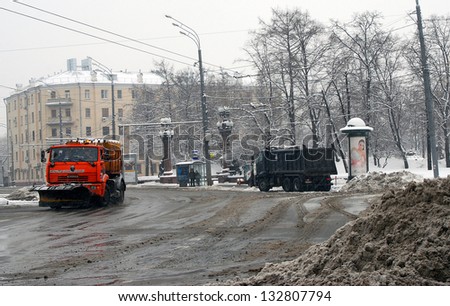 MOSCOW, RUSSIA - MARCH 15: Snow blower is clearing streets from snow. Extreme snowstorm in Moscow. Taken on March 15, 2013 in Moscow, Russia.