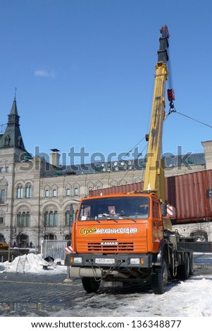 MOSCOW, RUSSIA - MARCH 28: A crane that is being used to dismantle the temporary skating rink on the Red Square by GUM on March 28, 2013 in Moscow. The area will be used for walking and public events.