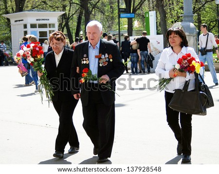MOSCOW, RUSSIA - MAY 09: A war veteran walks in the park. Victory Day celebration in the Gorky park on May 09, 2013 in Moscow.