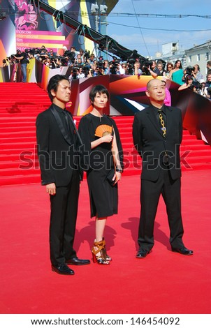 MOSCOW - JUNE 29: Japanese actor Shima Onisi, actress Yoko Maki, film director Tatsushi Omori (left to right) at 35 Moscow International Film Festival closing ceremony. Taken on 29.06.2013 in Moscow.