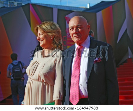 MOSCOW - JUNE 20: Tv host, journalist Vladimir Pozner with his wife at XXXV Moscow International Film Festival red carpet opening ceremony. Taken on June 20, 2013 in Moscow.
