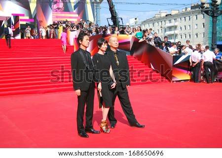 MOSCOW-JUNE 29: Japanese actor Shima Onisi, actress Yoko Maki, film director Tatsushi Omori (left to right) at 35 Moscow International Film Festival closing ceremony. Taken on June 29, 2013 in Moscow.