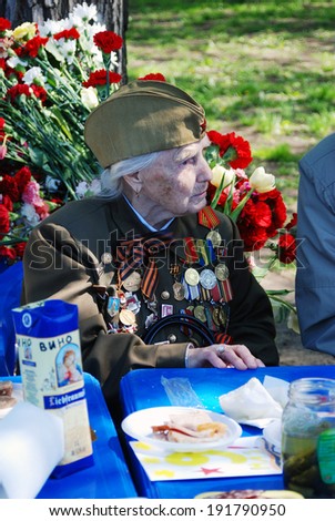 MOSCOW - MAY 09, 2014: Portrait of a war woman veteran. Victory Day celebration in Moscow.
