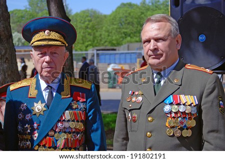 MOSCOW - MAY 09, 2014: Portrait of two war veterans. Victory Day celebration in Moscow.