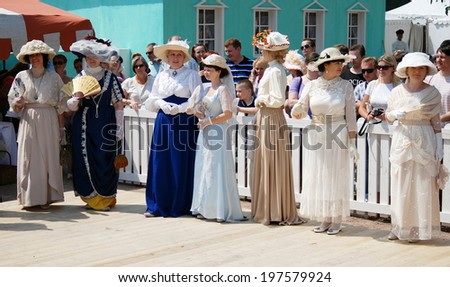 MOSCOW - JUNE 07, 2014: Portrait of women in historical costumes. Times and Ages International Historical Festival in Kolomenskoye park, Moscow.