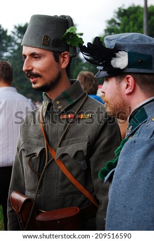 MOSCOW - JUNE 07, 2014: Portrait of two men in historical costumes. Times and Ages International Historical Festival in Kolomenskoye park, Moscow.