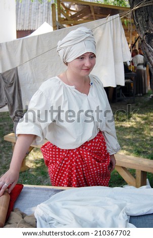MOSCOW - JUNE 07, 2014: Portrait of a person in historical costume. Times and Ages International Historical Festival in Kolomenskoye park, Moscow.