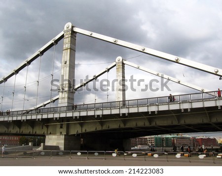 MOSCOW - AUGUST 31, 2014: View of the Crimean (Krymsky) bridge in Moscow from the Gorky park, a popular touristic landmark and place for walking in Moscow.