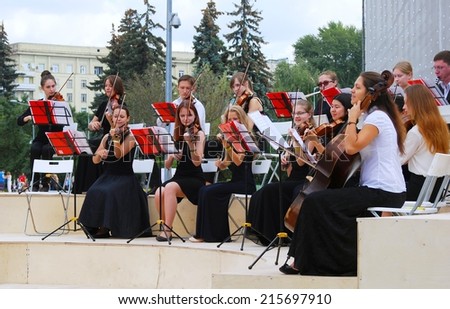 MOSCOW - SEPTEMBER 06, 2014: Orchestra plays in the Gorky park. Moscow City Day celebration in Moscow city center.