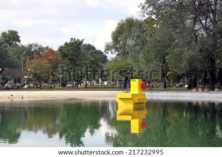 MOSCOW - SEPTEMBER 06, 2014: A wooden bird (duck) sculpture. View of the Gorky park in Moscow city center. A popular touristic landmark and place for walking.