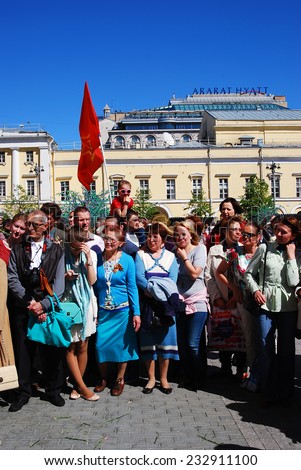 MOSCOW - MAY 09, 2014: War veterans sing war songs. Victory Day celebration in Moscow.