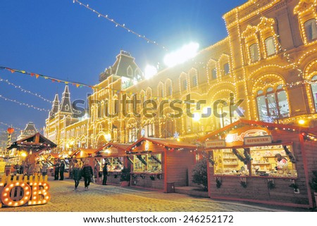 MOSCOW - JANUARY 22, 2015: Christmas fair on the Red Square in Moscow. View of GUM - Central Department Store, luxurt shopping mall and popular touristic landmark.