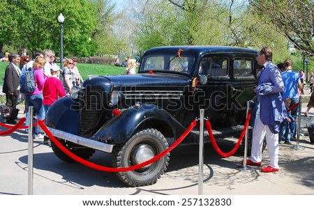 MOSCOW, RUSSIA - MAY 09: Vintage car. Holiday decoration on the Gorky park. Victory Day celebration on May 09, 2013 in Moscow.