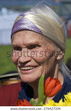MOSCOW - MAY 09, 2015: War veteran woman portrait. Victory Day celebration in Moscow.