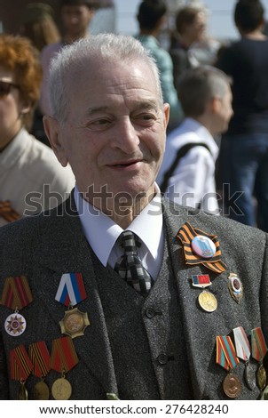 MOSCOW - MAY 09, 2015: War veteran man portrait. Victory Day celebration in Moscow.