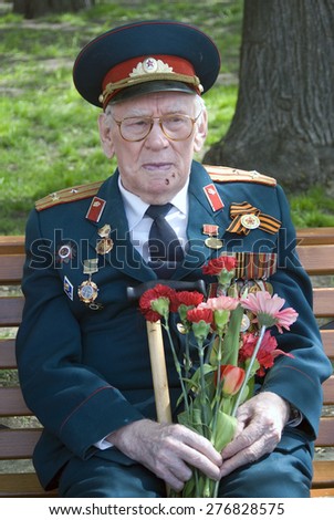 MOSCOW - MAY 09, 2015: War veteran portrait. Victory Day celebration in Moscow.