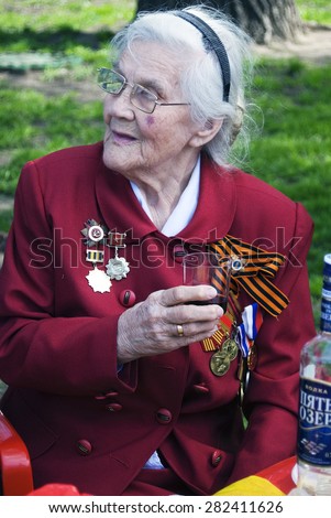 MOSCOW - MAY 09, 2015: War veteran woman portrait.Victory Day celebration in Moscow.
