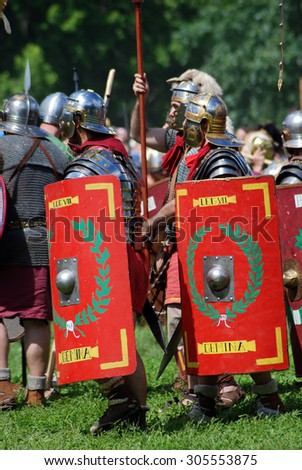 MOSCOW - JUNE 06, 2015: Persons in historical costumes at historical festival Times and Ages. Ancient Rome in Kolomenskoye park, Moscow.