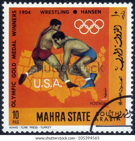 SOUTH ARABIA - CIRCA 1968: stamp printed in Mahra State of South Arabia shows an image of American sportsman Hansen, winner in wrestling in Olympic Games  St. Louis , Missouri 1904, series, circa 1968