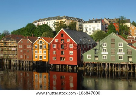 TRONDHEIM,NORWAY- MAY 25 : Typical houses on the river Nidelva on May 25, 2008 in Trondheim, Norway. The city was founded by the Vikings, is the third largest city in Norway.
