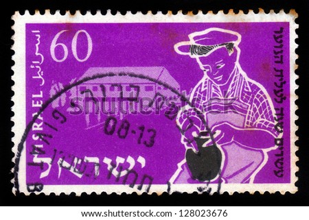 ISRAEL - CIRCA 1955: A stamp printed in Israel, shows young boy being trained, to potter\'s craft ,  issued in honor of 20th anniversary of Youth Aliyah , training of the crafts, series, circa 1955