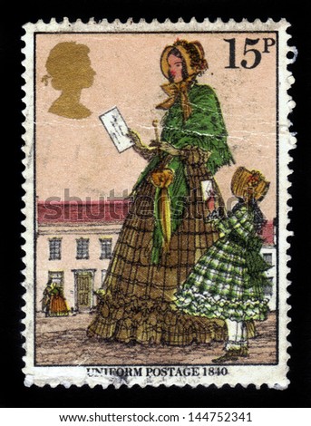 UNITED KINGDOM - CIRCA 1979: A stamp printed in Great Britain shows english girl mailman in uniform 1840, circa 1979